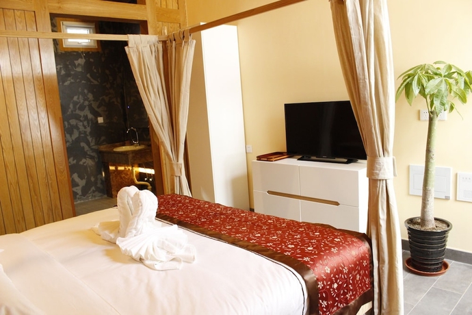 Imagen de la habitación del Hotel Beijing Mingcourtyard. Foto 14