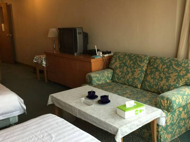 Imagen general del Hotel Beijing New World CBD Apartment. Foto 3