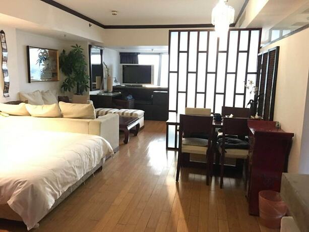 Imagen general del Hotel Beijing New World CBD Apartment. Foto 5