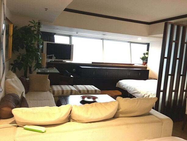 Imagen general del Hotel Beijing New World CBD Apartment. Foto 1