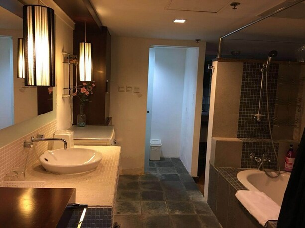 Imagen de la habitación del Hotel Beijing New World CBD Apartment. Foto 26