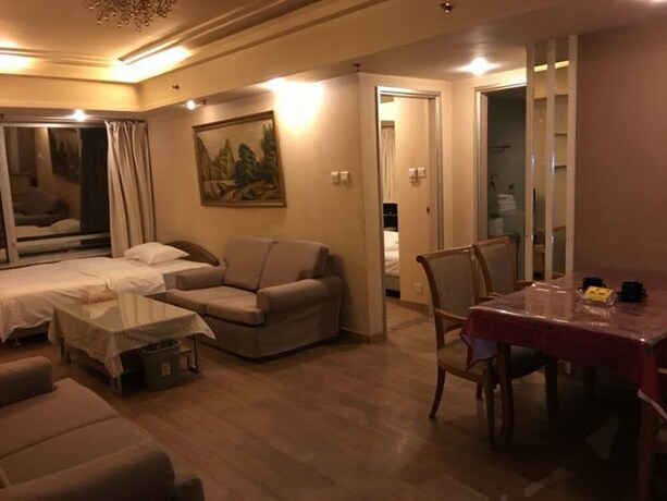 Imagen de la habitación del Hotel Beijing New World CBD Apartment. Foto 33