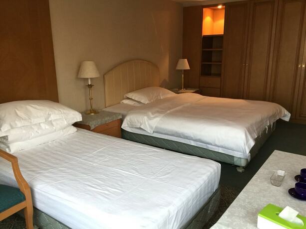 Imagen de la habitación del Hotel Beijing New World CBD Apartment. Foto 36
