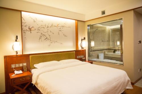 Imagen de la habitación del Hotel Beijing Palace. Foto 7