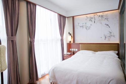 Imagen de la habitación del Hotel Beijing Palace. Foto 8