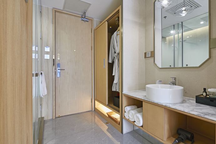 Imagen de la habitación del Hotel Beijing Palace Garden Beiqing. Foto 6