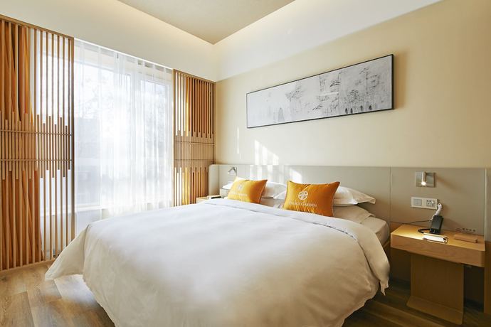 Imagen de la habitación del Hotel Beijing Palace Garden Beiqing. Foto 11