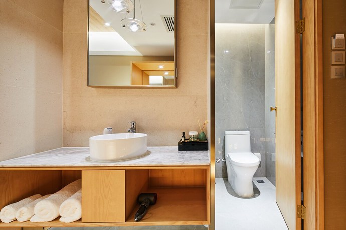 Imagen de la habitación del Hotel Beijing Palace Garden Beiqing. Foto 15