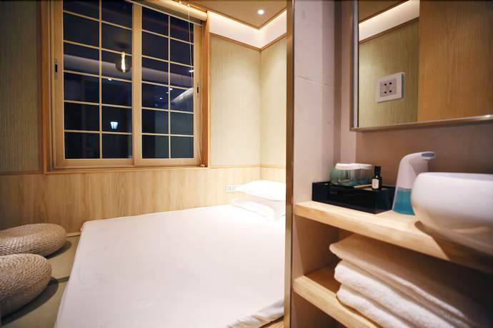Imagen de la habitación del Hotel Beijing Palace Garden Beiqing. Foto 16