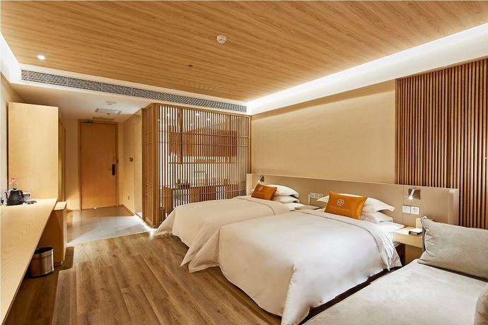 Imagen de la habitación del Hotel Beijing Palace Garden Beiqing. Foto 17