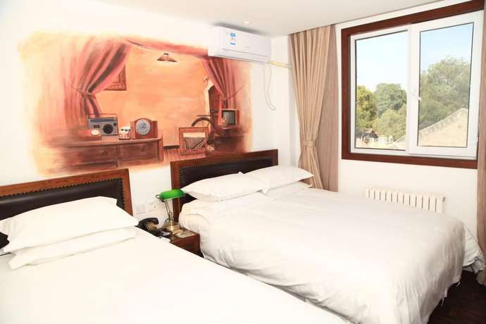 Imagen de la habitación del Hotel Beijing Perfect Inn. Foto 13