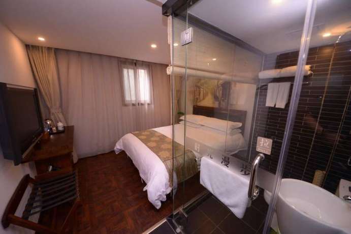 Imagen de la habitación del Hotel Beijing Perfect Inn. Foto 15