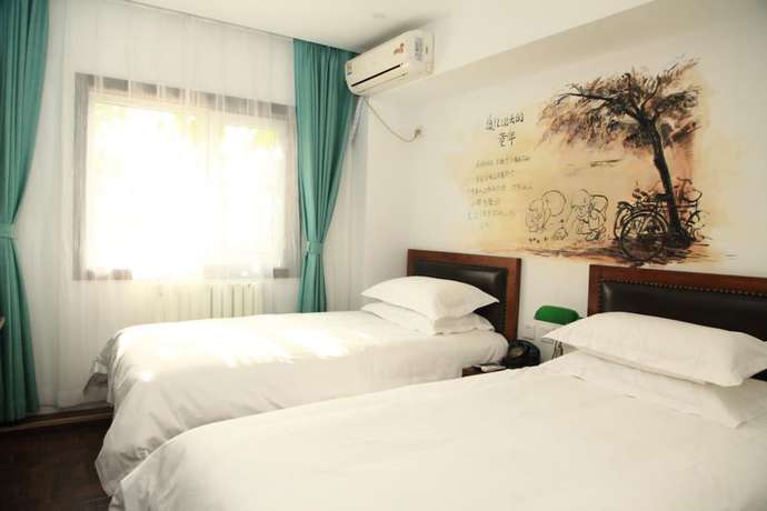 Imagen de la habitación del Hotel Beijing Perfect Inn. Foto 16