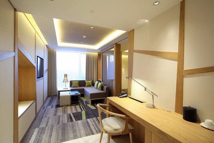 Imagen de la habitación del Hotel Beijing Qianyuan. Foto 9