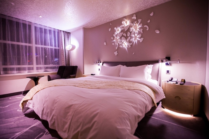 Imagen de la habitación del Hotel Beijing Qianyuan. Foto 10