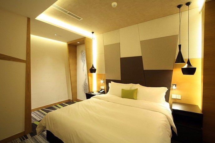 Imagen de la habitación del Hotel Beijing Qianyuan. Foto 12