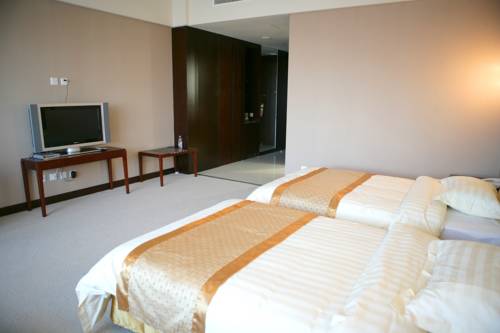 Imagen de la habitación del Hotel Beijing Qiao Bo International Convention Center Ho. Foto 5