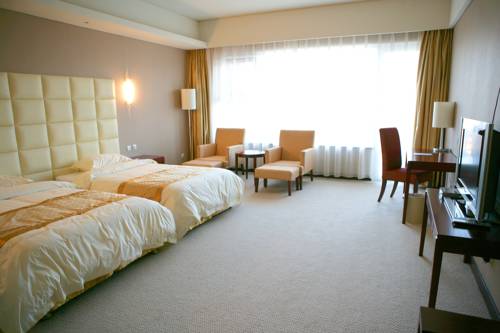Imagen de la habitación del Hotel Beijing Qiao Bo International Convention Center Ho. Foto 6