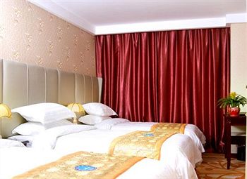 Imagen de la habitación del Hotel Beijing Qihang International. Foto 4