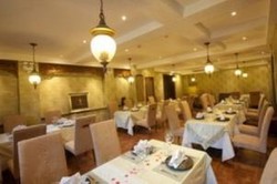 Imagen del bar/restaurante del Hotel Beijing Redwall Garden Hotel. Foto 6