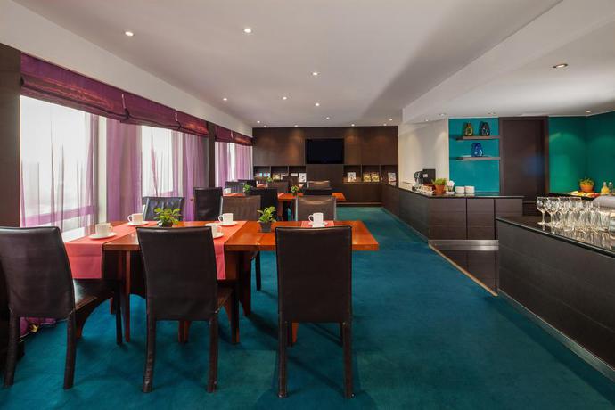 Imagen de los interiores del Hotel Beijing Royal Grand. Foto 7