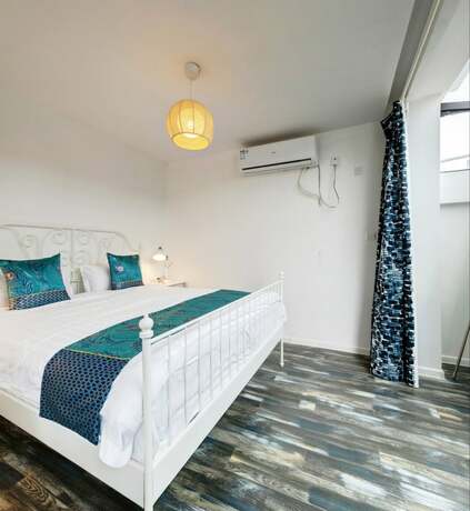 Imagen de la habitación del Hotel Beijing Ru Xi Inn. Foto 18