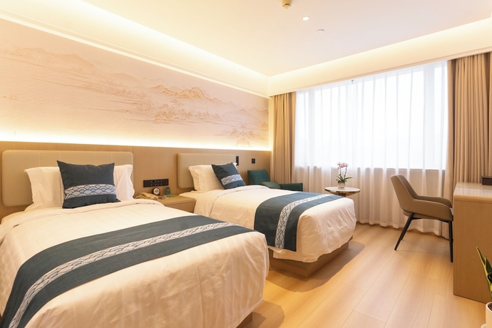 Imagen de la habitación del Hotel Beijing Shengli. Foto 4