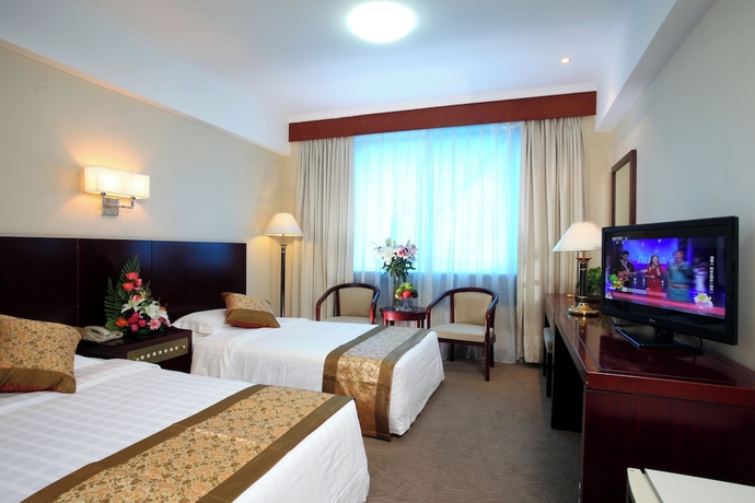Imagen de la habitación del Hotel Beijing Shengli. Foto 6