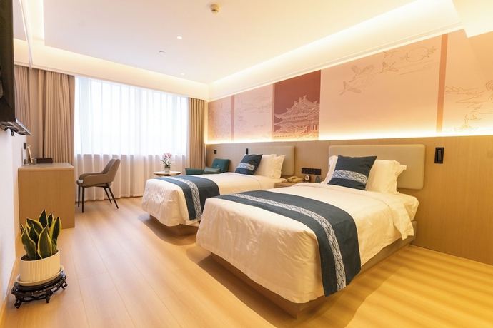 Imagen de la habitación del Hotel Beijing Shengli. Foto 12