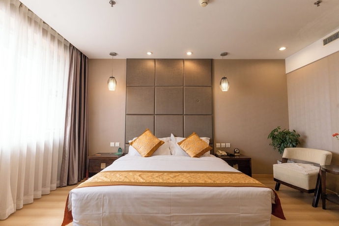Imagen de la habitación del Hotel Beijing Shengli. Foto 13