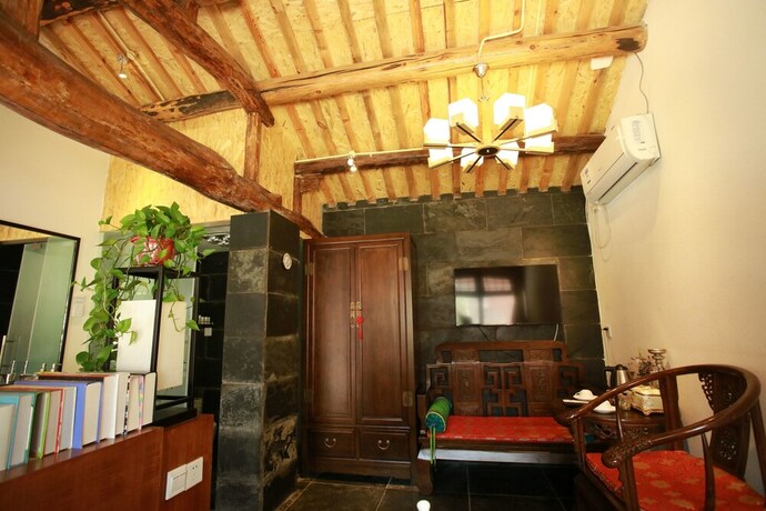 Imagen de la habitación del Hotel Beijing Shiguang Greatwall Boutique Inn. Foto 11