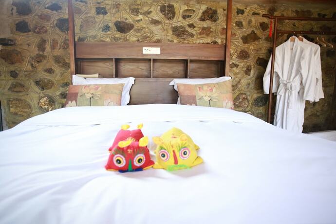Imagen de la habitación del Hotel Beijing Shiguang Greatwall Boutique Inn. Foto 13