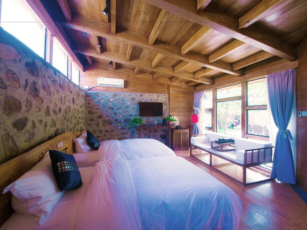 Imagen de la habitación del Hotel Beijing Shiguang Greatwall Boutique Inn. Foto 23