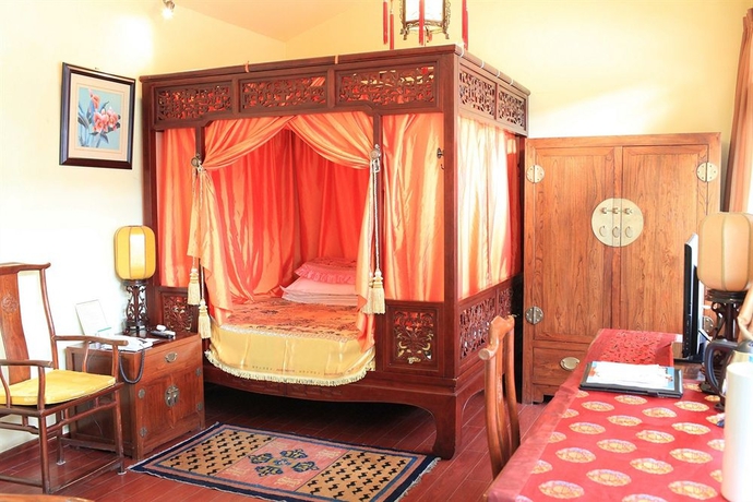 Imagen de la habitación del Hotel Beijing Sihe Courtyard. Foto 5