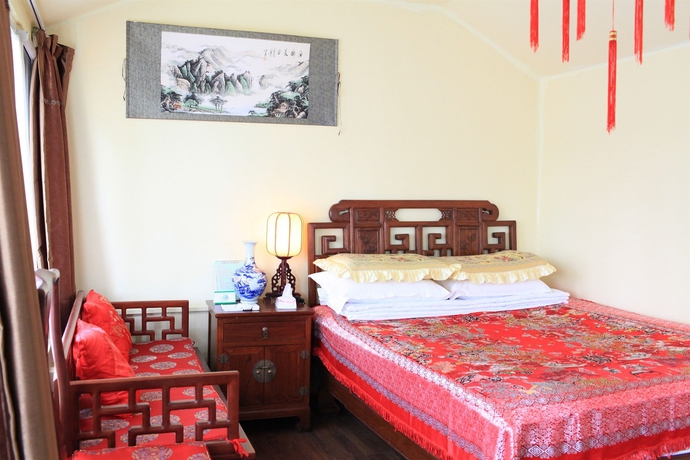 Imagen de la habitación del Hotel Beijing Sihe Courtyard. Foto 6