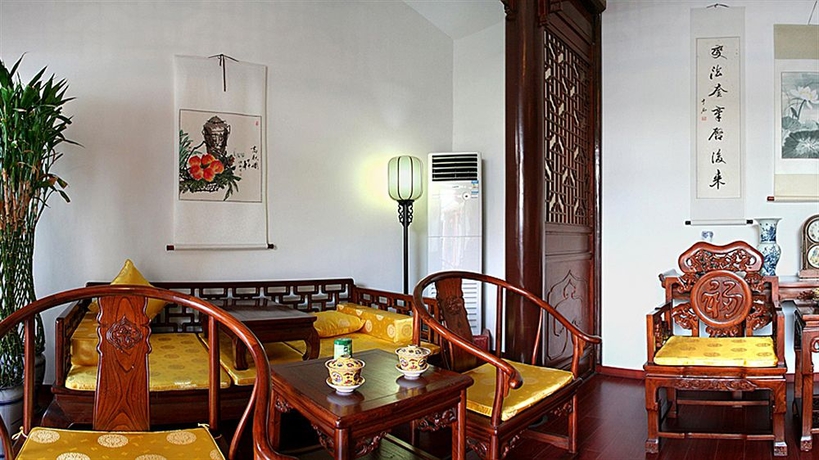 Imagen de los interiores del Hotel Beijing Sihe Courtyard. Foto 13