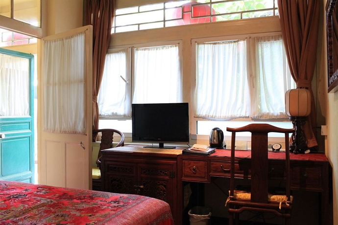 Imagen de la habitación del Hotel Beijing Sihe Courtyard. Foto 10