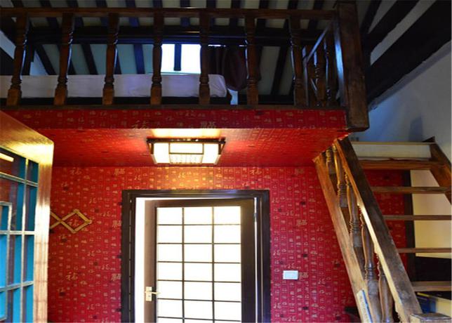 Imagen de la habitación del Hotel Beijing Siheju Courtyard Hotel. Foto 4