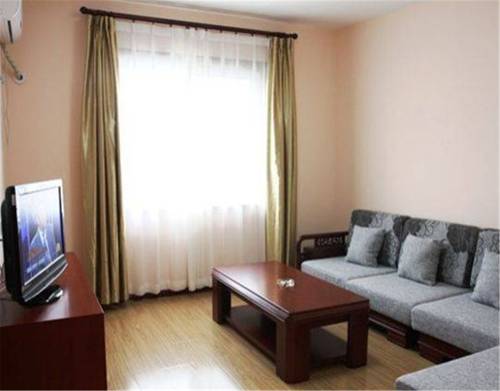 Imagen de la habitación del Hotel Beijing Silvery Ocean. Foto 7