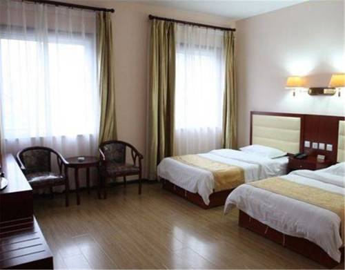 Imagen de la habitación del Hotel Beijing Silvery Ocean. Foto 9