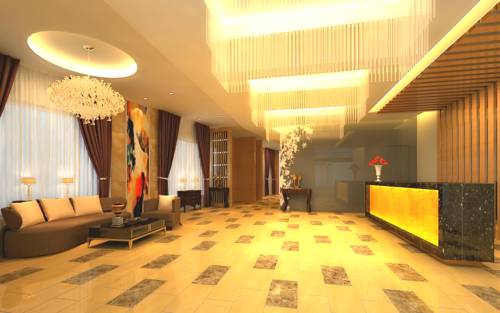 Imagen de la habitación del Hotel Beijing Sky House Business. Foto 2
