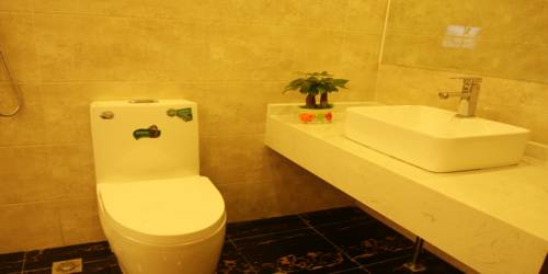 Imagen de la habitación del Hotel Beijing Sky House Business. Foto 3