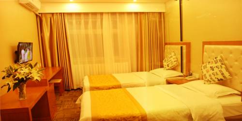 Imagen de la habitación del Hotel Beijing Sky House Business. Foto 4