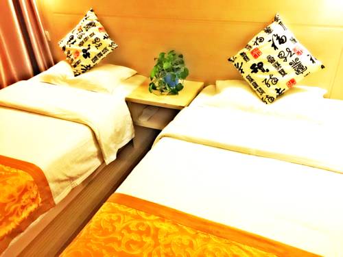 Imagen de la habitación del Hotel Beijing Sky House Business. Foto 5