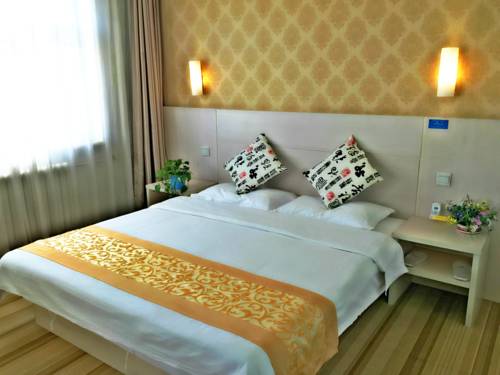 Imagen de la habitación del Hotel Beijing Sky House Business. Foto 9