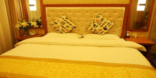 Imagen de la habitación del Hotel Beijing Sky House Business. Foto 10