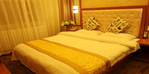 Imagen de la habitación del Hotel Beijing Sky House Business. Foto 12