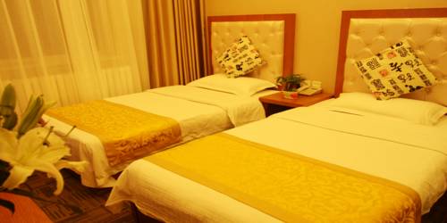 Imagen de la habitación del Hotel Beijing Sky House Business. Foto 13