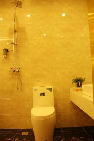 Imagen de la habitación del Hotel Beijing Sky House Business. Foto 14