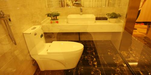 Imagen de la habitación del Hotel Beijing Sky House Business. Foto 15